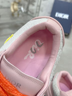 Pink interior lining of a pink and white low-top sneaker
