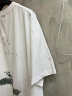 White short-sleeve T-shirt with distressed graphic print on back