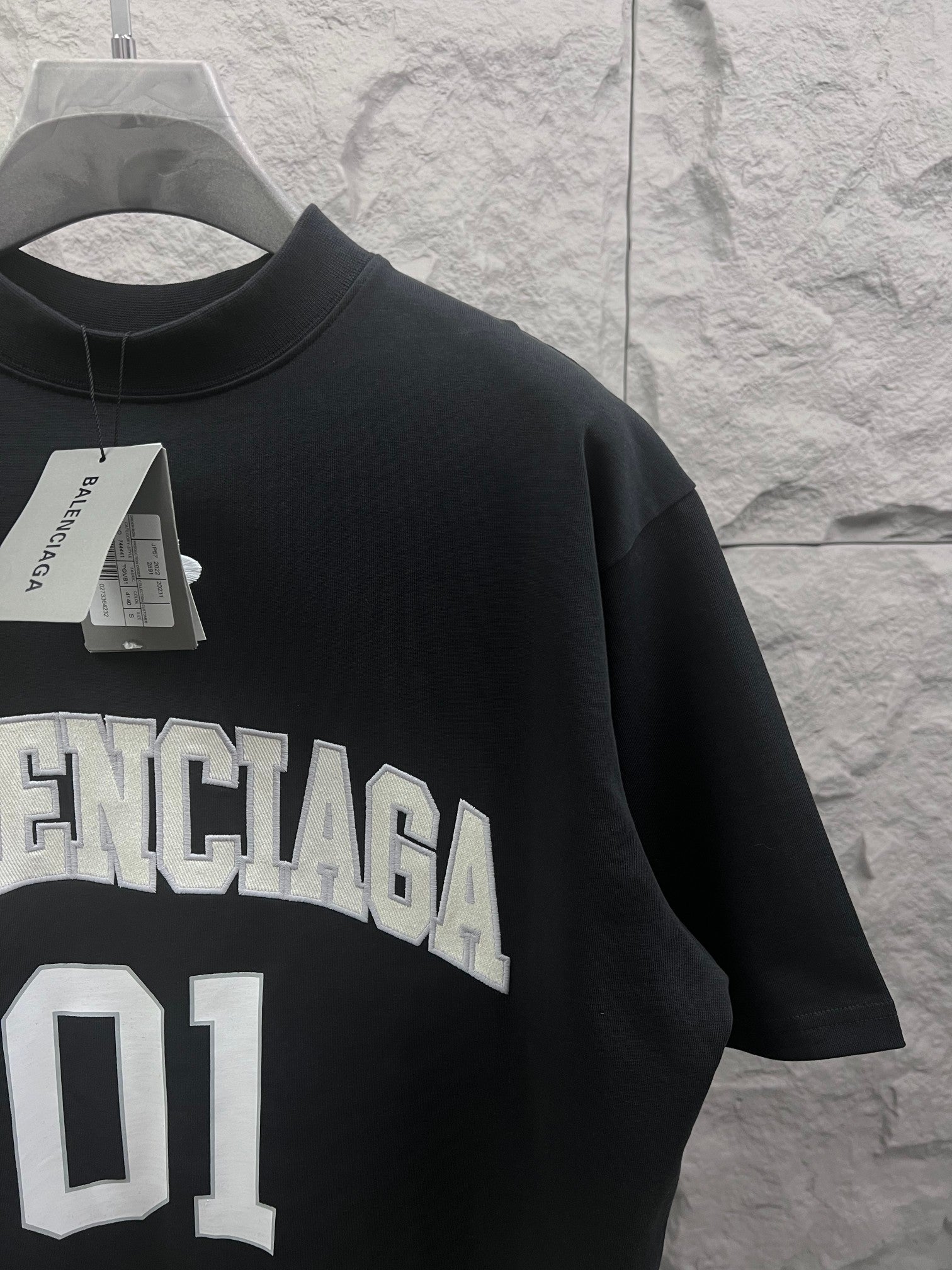 Balenciaga T-shirt in dark navy with “BALENCIAGA 01” logo and size tag