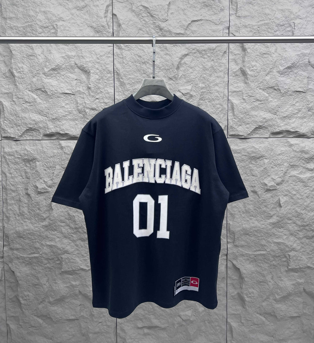 Balenciaga T-shirt in dark navy with “BALENCIAGA” and large “01” front print