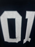 Balenciaga T-shirt close-up showing white “0” and “1” back numbers