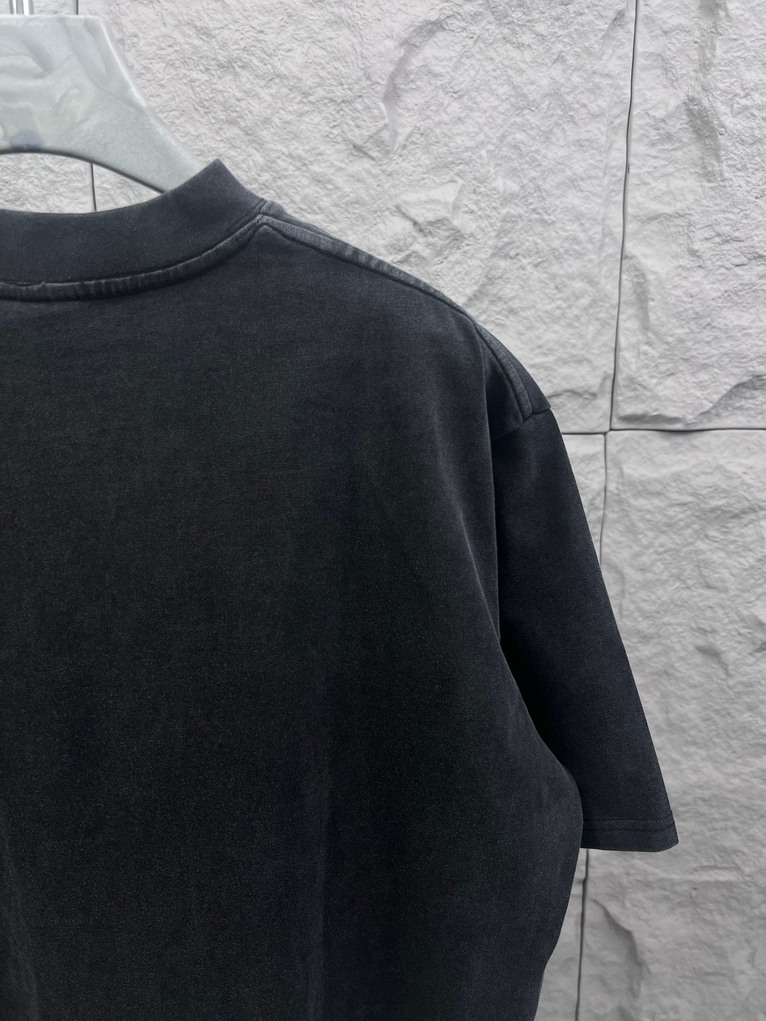 Balenciaga dark crewneck T-shirt with plain back and relaxed shoulders