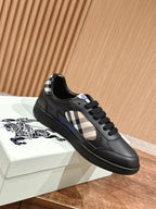 Burberry black low-top sneakers with check swoosh-style side panel