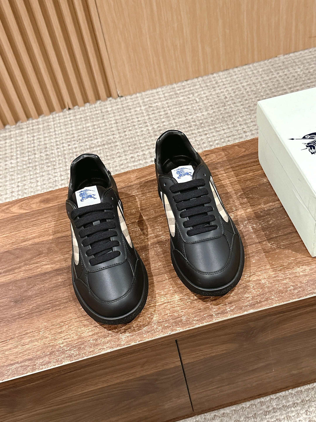 Burberry black leather low-top sneakers with black laces and check panel