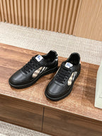 Burberry black low-top sneakers with check side stripe and black lace-up