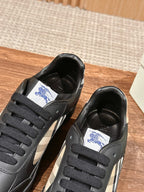 Burberry black leather sneakers with check side panel and lace-up front