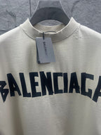 Balenciaga short-sleeve T-shirt close-up of front logo print and tag
