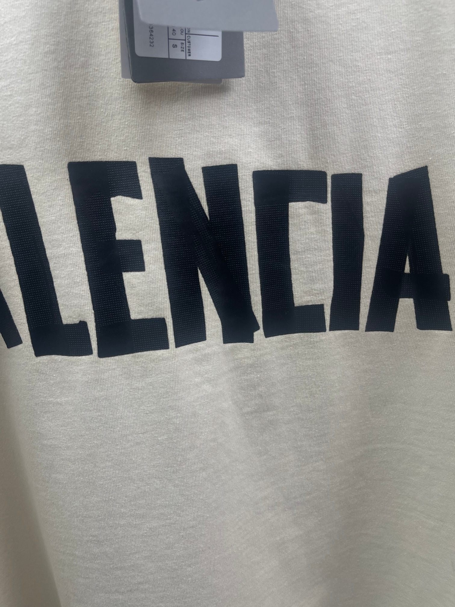 Balenciaga short-sleeve T-shirt close-up of large front logo lettering