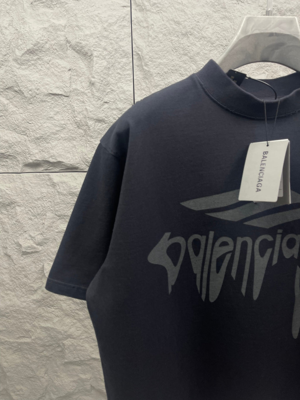 Balenciaga navy short-sleeve T-shirt with front logo and hanging tags