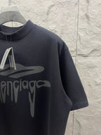 Balenciaga navy T-shirt close-up of front logo print