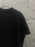 Black crewneck T-shirt with plain shoulder and collar
