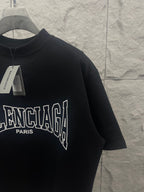 Black Balenciaga T-shirt close-up of front logo and collar tag