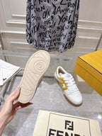 Fendi sneakers outsole with white upper and yellow heel accent