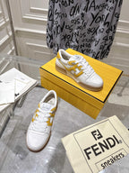 Fendi white leather sneakers with yellow accents and tan sole, lace-up