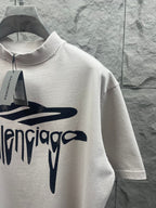 White Balenciaga T-shirt close-up with large front logo graphic