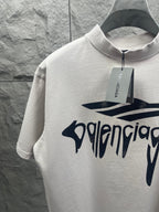 White Balenciaga T-shirt with front logo graphic and neck tag