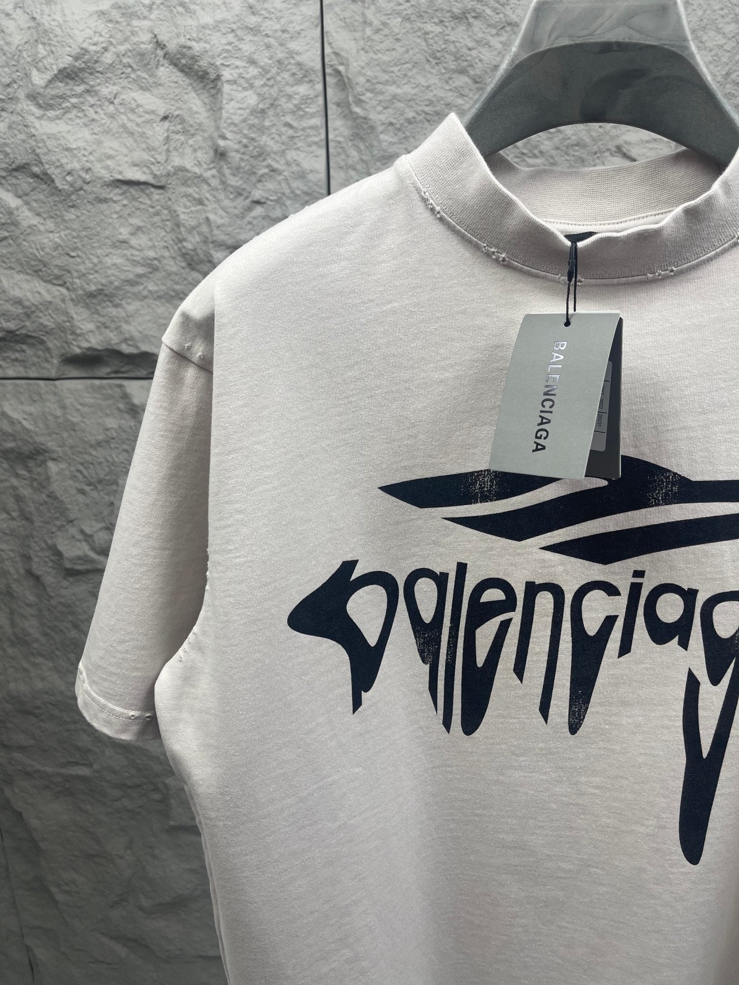 White Balenciaga T-shirt with front logo graphic and neck tag