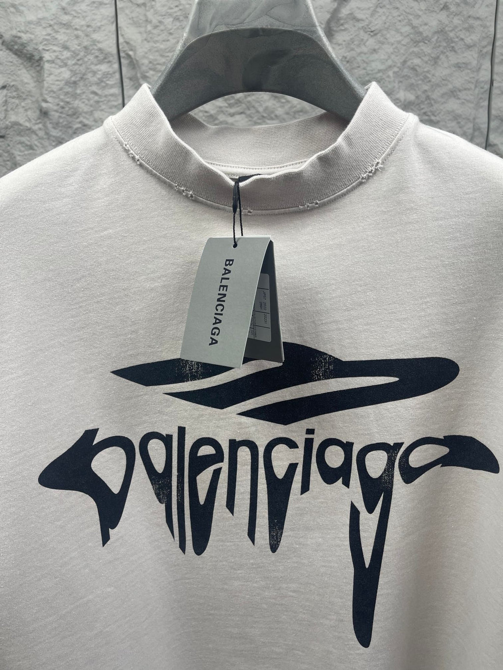 White Balenciaga T-shirt with front logo graphic and round studded collar