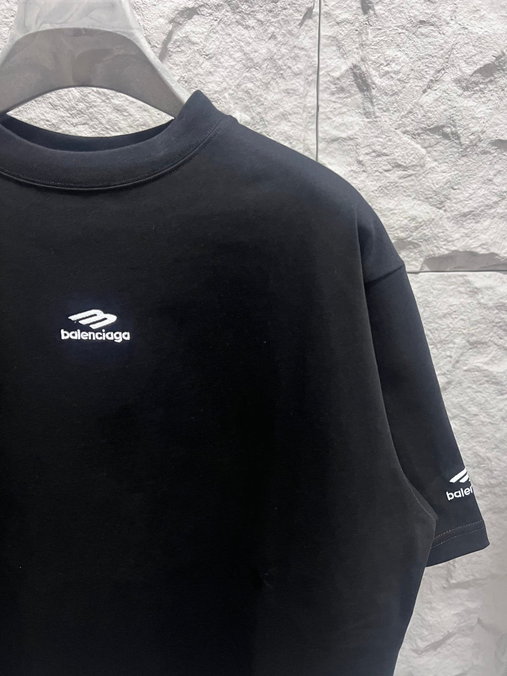 Black short-sleeve T-shirt with Balenciaga logo on left chest