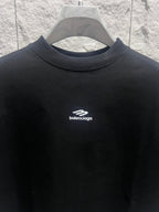 Black short-sleeve T-shirt with round crew neck and Balenciaga logo at chest