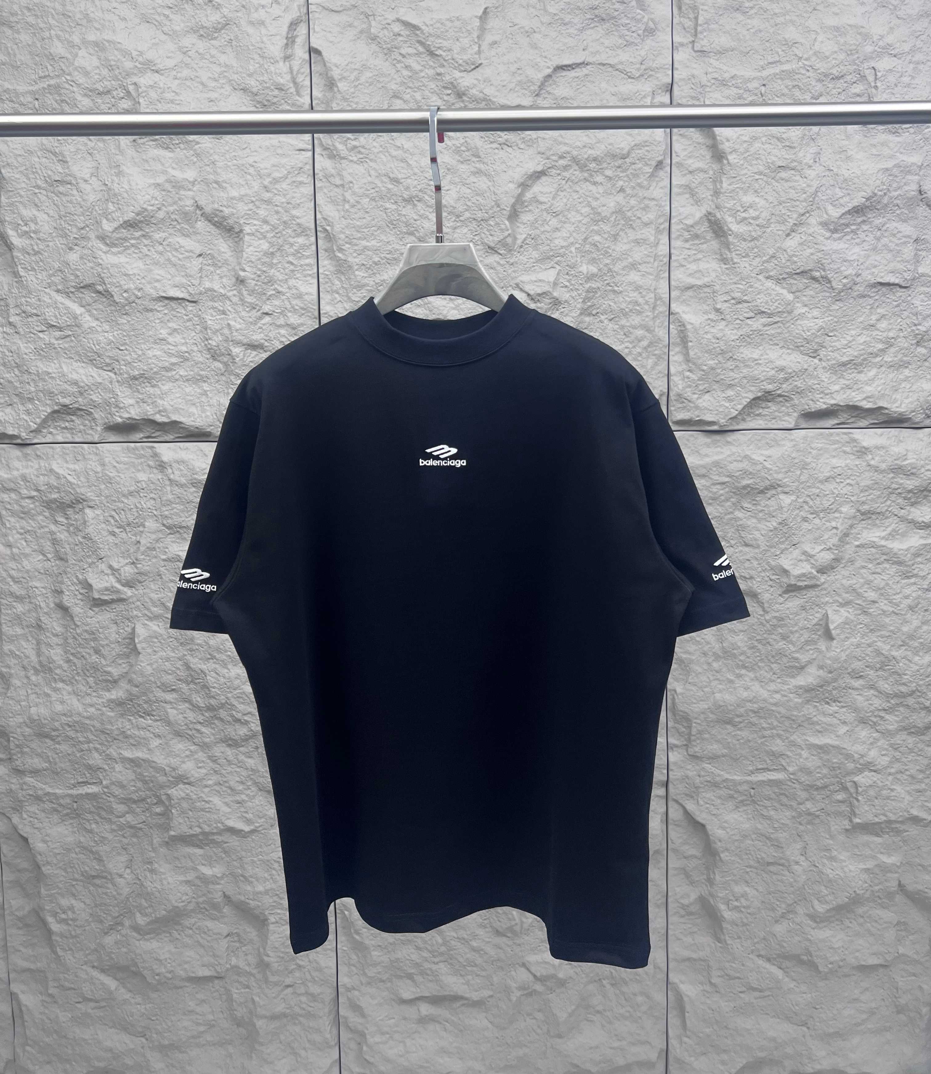 Black short-sleeve T-shirt with Balenciaga logo at chest