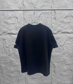 Black short-sleeve T-shirt, plain back with Balenciaga logo on sleeve