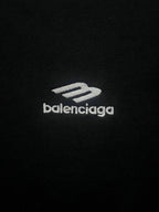 Black T-shirt with white balenciaga logo on chest