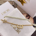 Pearl beaded bracelet with gold chain, DIOR letters and star charm
