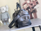 Louis Vuitton men's duffel bag with crossbody strap and zipped top, dark blue leather