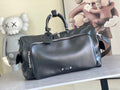 Louis Vuitton men's duffel bag with top handles and shoulder strap, dark blue leather finish