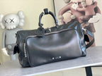 Louis Vuitton duffel bag in dark leather with top handles and front zip pocket