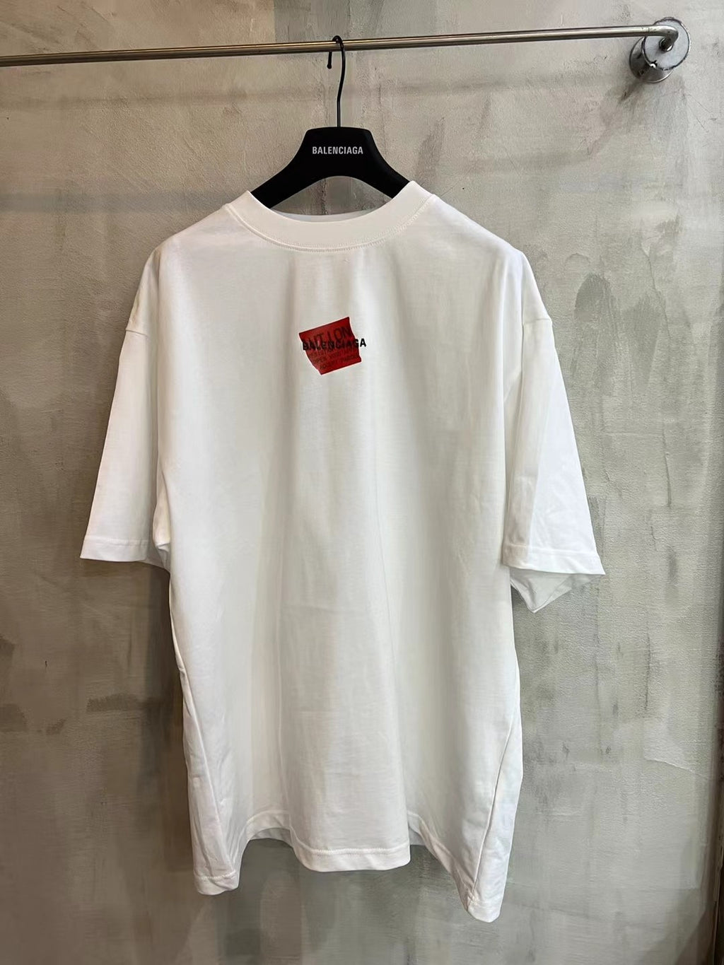 Balenciaga white T-shirt with crew neck and small red logo patch