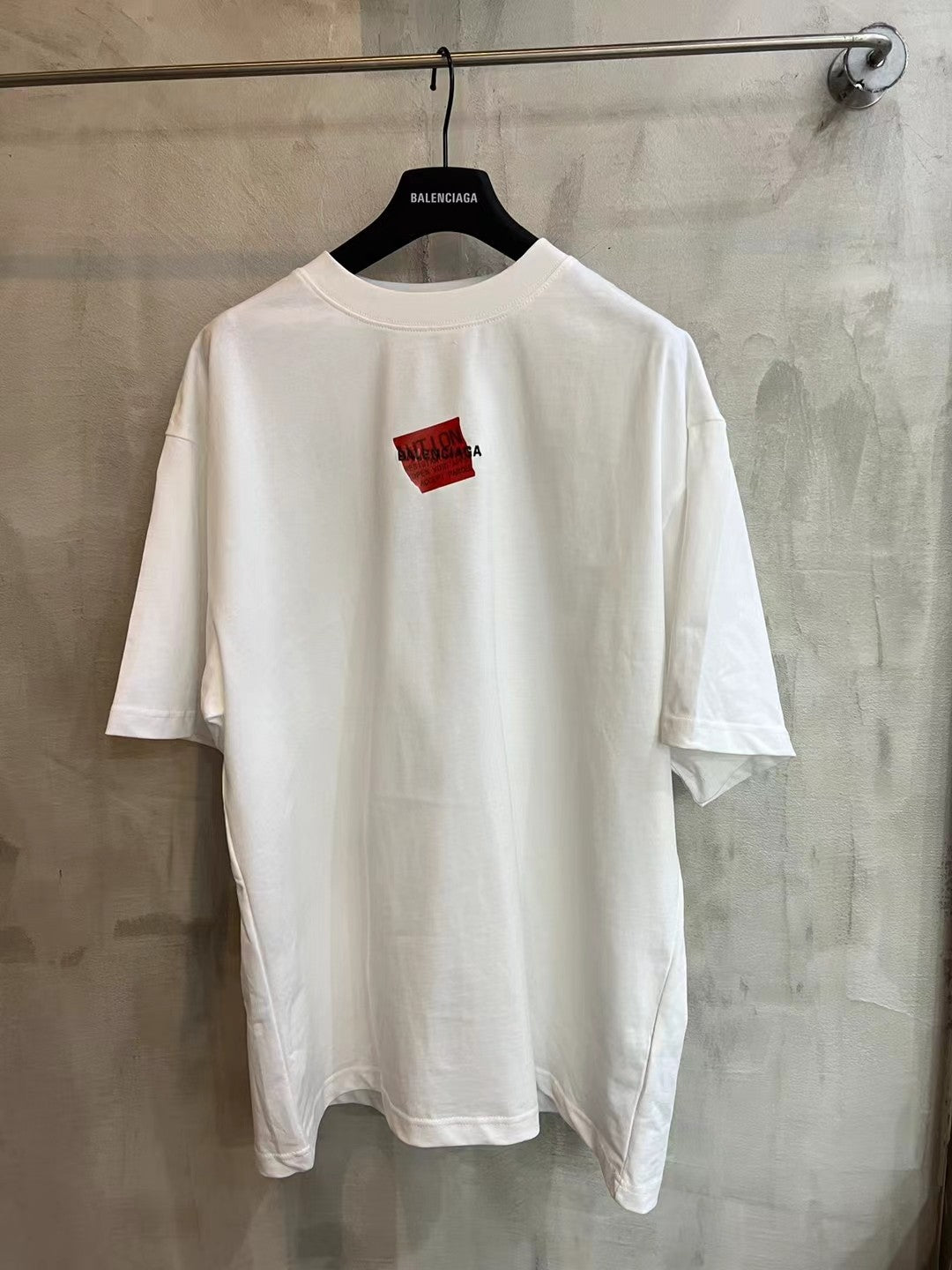 Balenciaga white T-shirt with crew neck and small red logo patch