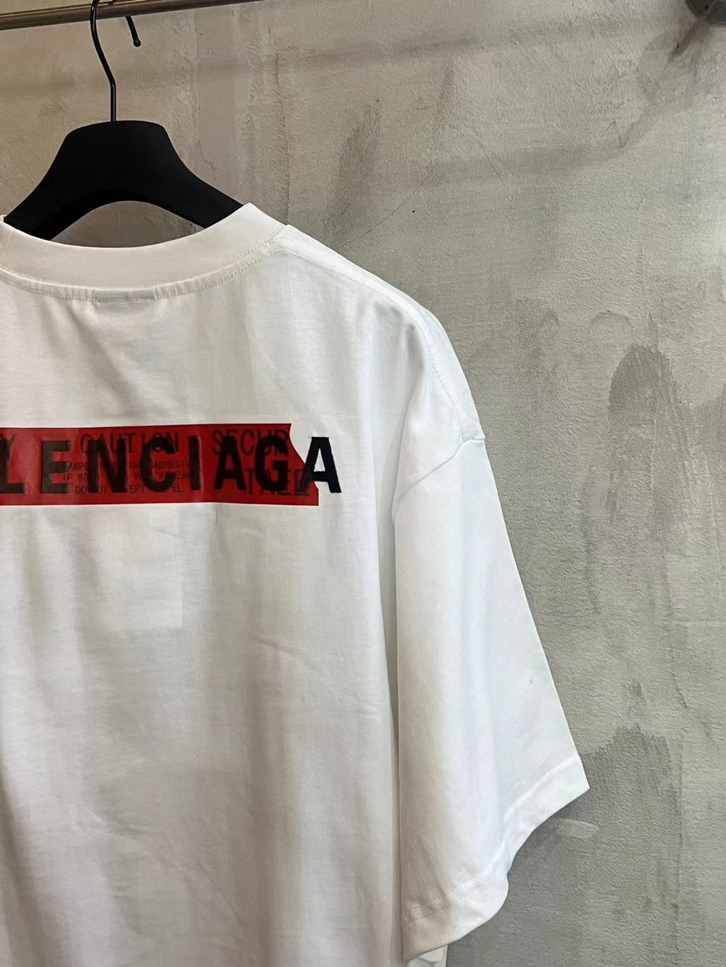 Balenciaga white T-shirt back with large red BALENCIAGA logo