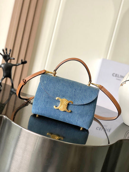 Celine denim flap bag, gold logo clasp, tan leather handles, blue wash