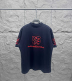 Balenciaga dark T-shirt with red shield and Balenciaga logo, crew neck, short sleeves