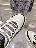 Fendi unisex sneaker close-up, white leather with gray laces and black trim