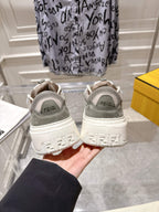 Gray and white Fendi sneakers with back logos, heel view