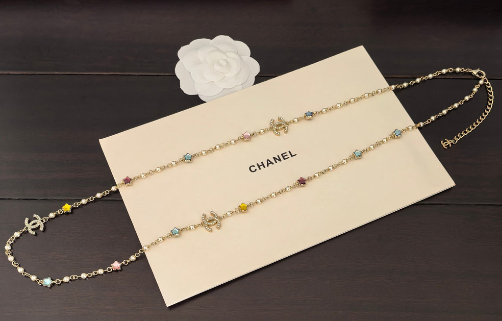 Gold-tone Chanel necklace with two thin chains and multicolor gemstone charms