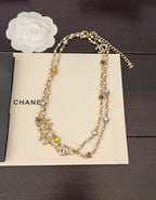 Gold-tone Chanel beaded charm necklace with multicolor gemstone stones and chain links