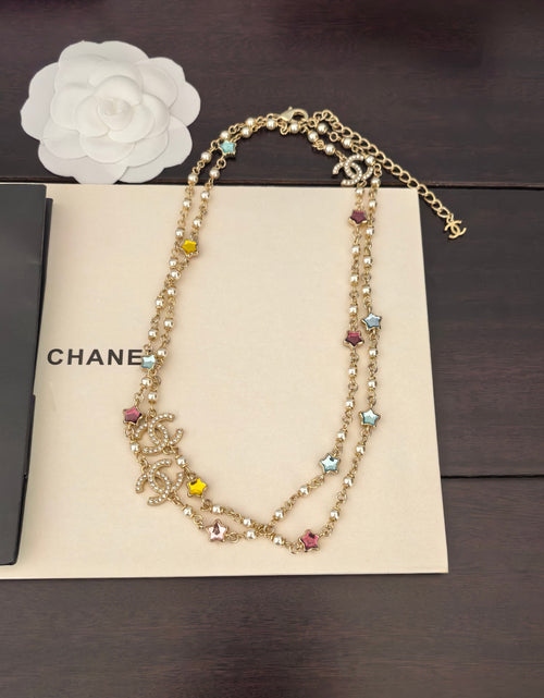 Gold-tone Chanel beaded charm necklace with multicolor gemstone stones and chain links