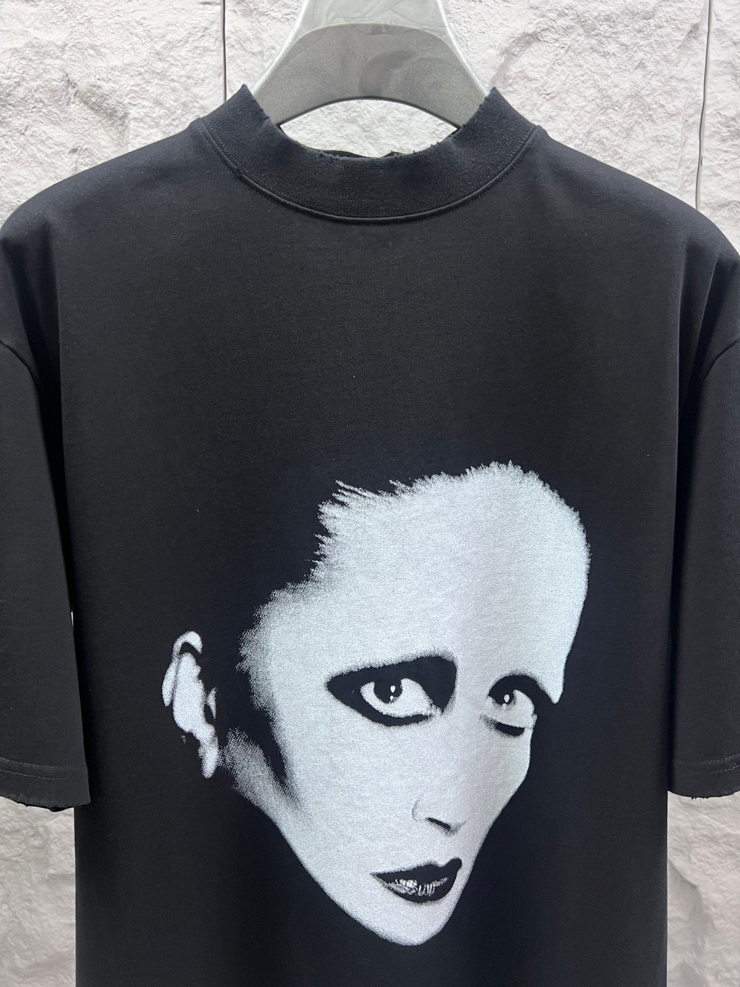 Balenciaga black T-shirt with white face portrait graphic on chest