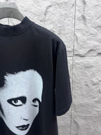 Balenciaga black T-shirt with partial white face portrait graphic