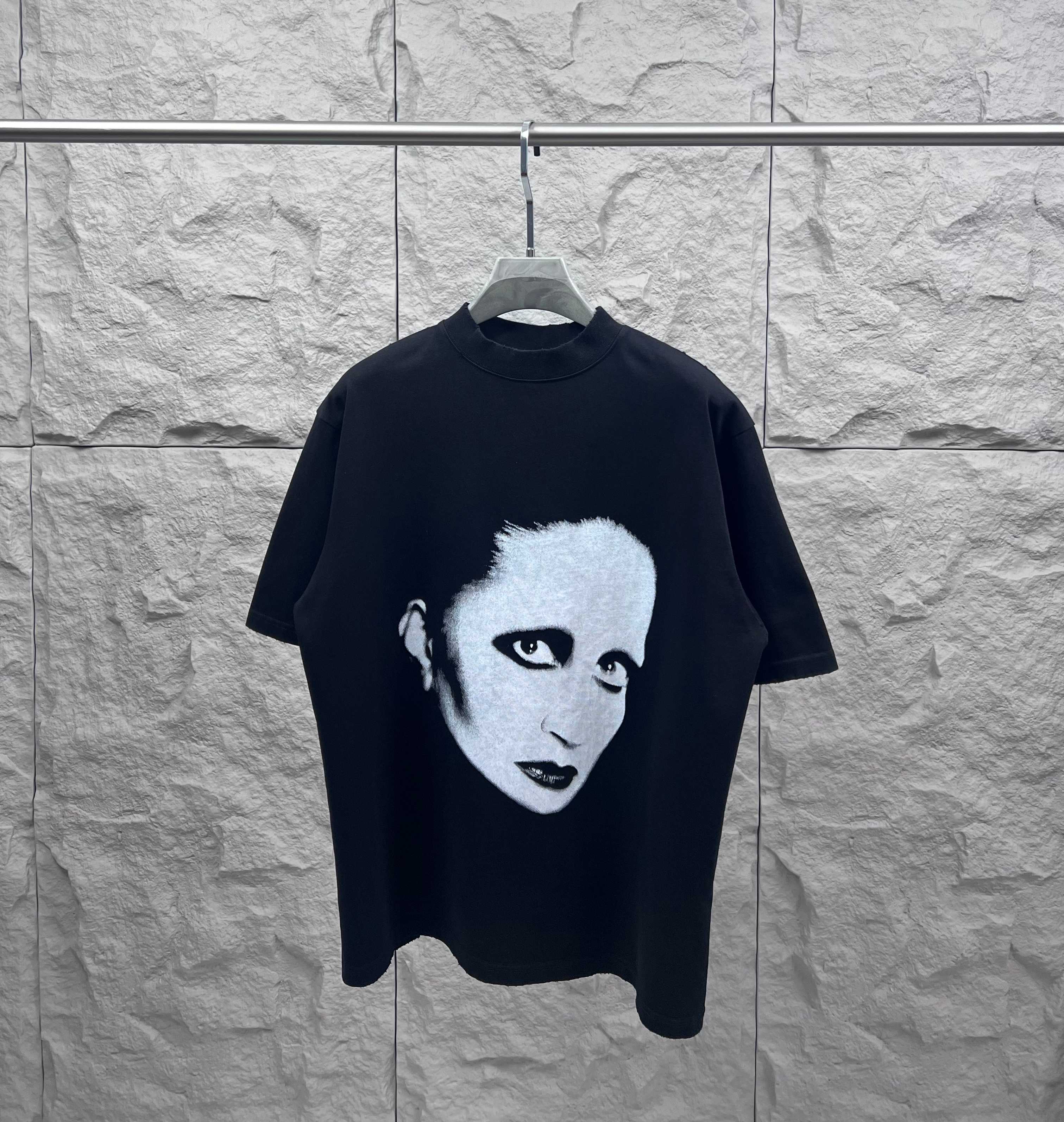 Balenciaga black T-shirt with white face graphic on front