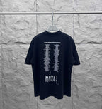 Balenciaga black T-shirt with printed text and white Mina logo on back