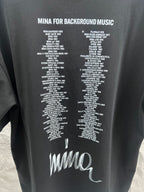 Balenciaga black T-shirt back with printed list text and white Mina logo