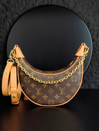 Louis Vuitton hobo bag with shoulder strap, monogram canvas and tan leather trim