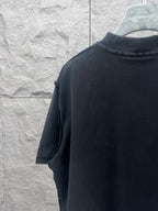 Dark T-shirt back view with short sleeves