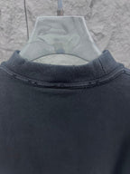 Dark T-shirt neckline and upper back seam detail