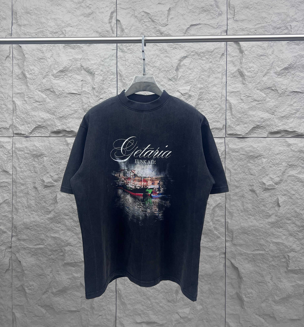 Balenciaga short-sleeve T-shirt in dark color with front graphic print and crew neckline